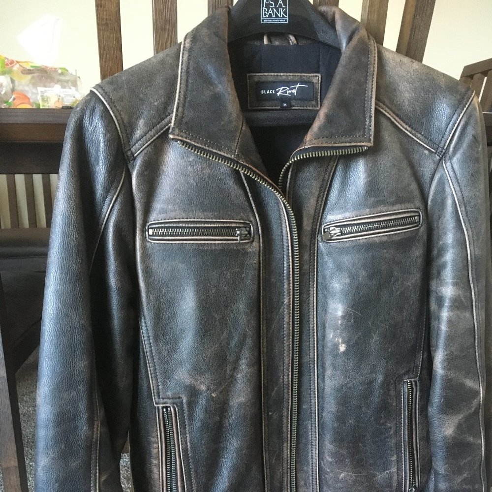 Black Rivet motocycle leather jacket